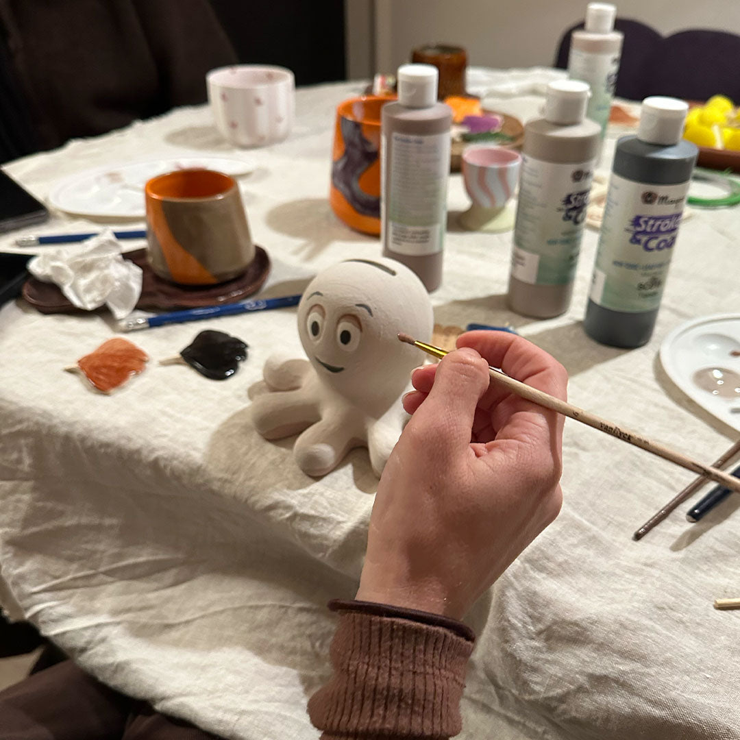 Workshop: keramiek schilderen bij Nyumba