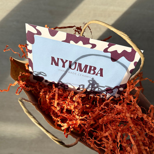 Gratis cadeauservice met Nyumba-tasje + persoonlijk kaartje